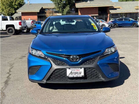 2019 Toyota Camry for sale at Armando Auto Sales in Fresno CA