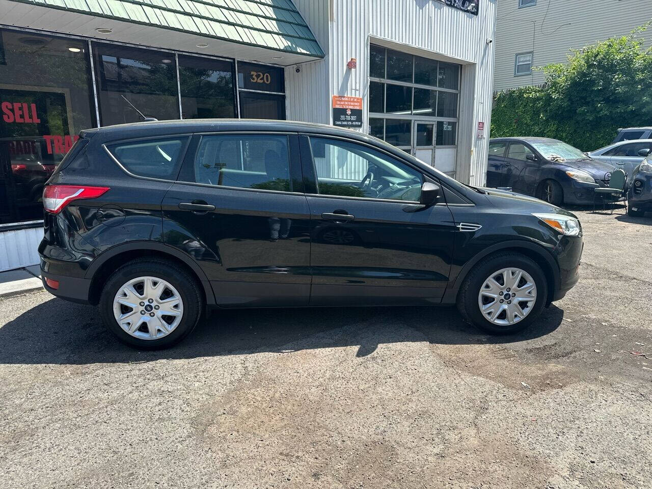 2013 Ford Escape for sale at MBM Group LLC Auto Sales in Kearny, NJ