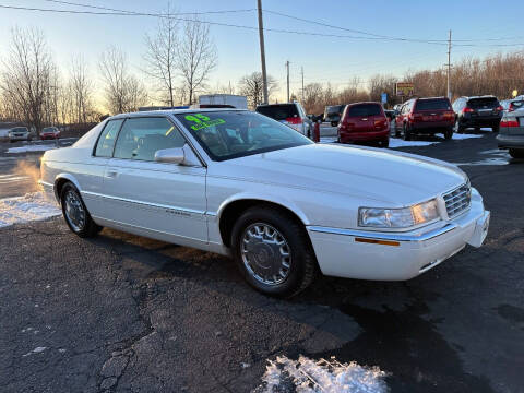 1995 Cadillac Eldorado for sale at VILLAGE AUTO MART LLC in Portage IN