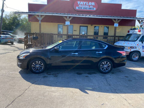 2015 Nissan Altima for sale at Taylor Trading Co in Beaumont TX