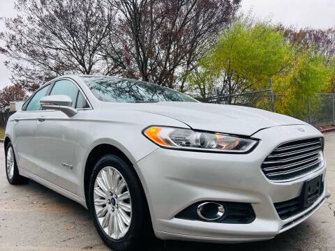 2013 Ford Fusion Hybrid for sale at Cobb Luxury Cars in Marietta GA