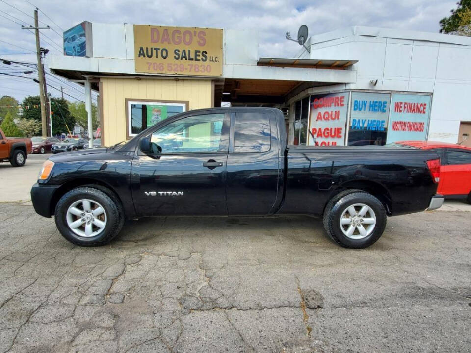 2011 Nissan Titan for sale at DAGO'S AUTO SALES LLC in Dalton, GA