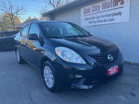 2014 Nissan Versa for sale at Oak City Motors in Garner NC