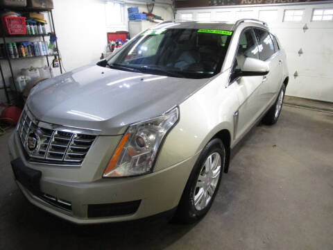 2015 Cadillac SRX for sale at Ideal Auto Sales, Inc. in Waukesha WI