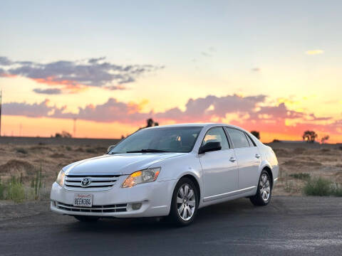 2006 Toyota Avalon for sale at BARMAN AUTO INC in Bakersfield CA