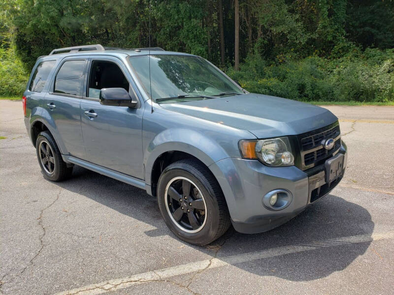 2011 Ford Escape for sale at GEORGIA AUTO DEALER LLC in Buford GA