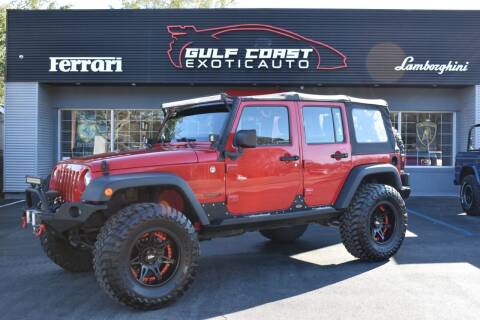 2014 Jeep Wrangler Unlimited for sale at Gulf Coast Exotic Auto in Gulfport MS
