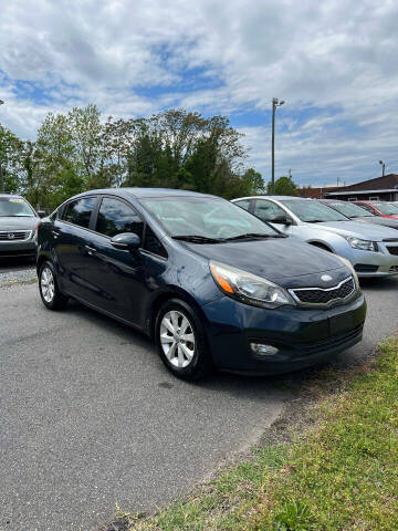 2013 Kia Rio for sale at Noble Auto in Hickory NC