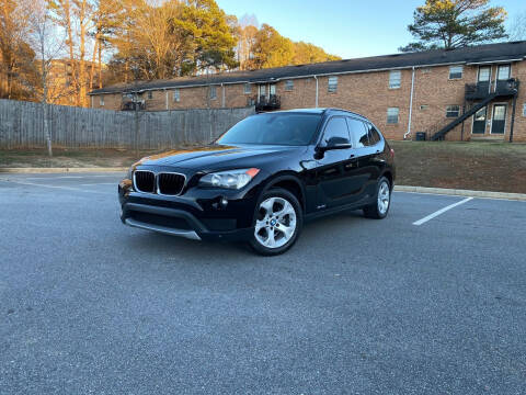 2014 BMW X1 for sale at VELEZ MOTOR COMPANY LLC in Orlando FL