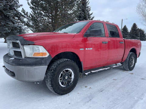 2010 Dodge Ram Pickup 1500 for sale at BELOW BOOK AUTO SALES in Idaho Falls ID