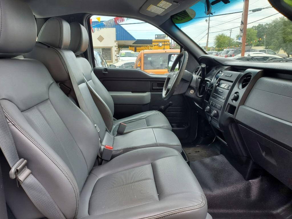 2013 Ford F-150 for sale at DAGO'S AUTO SALES LLC in Dalton, GA