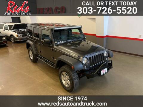 2014 Jeep Wrangler Unlimited for sale at Red's Auto and Truck in Longmont CO