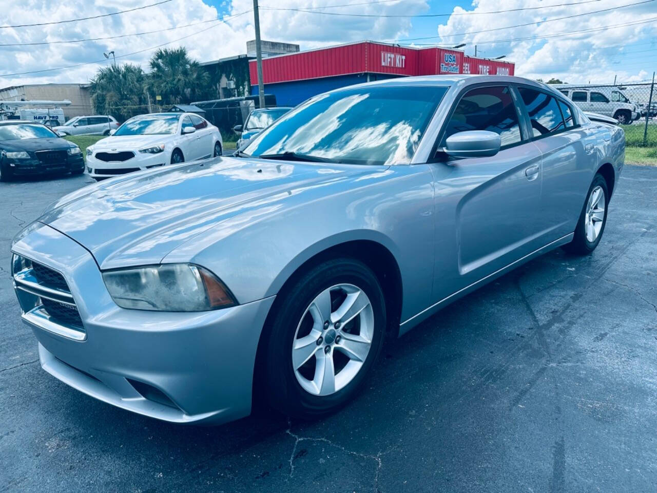 2013 Dodge Charger for sale at NOVA AUTO SALES in Orlando, FL