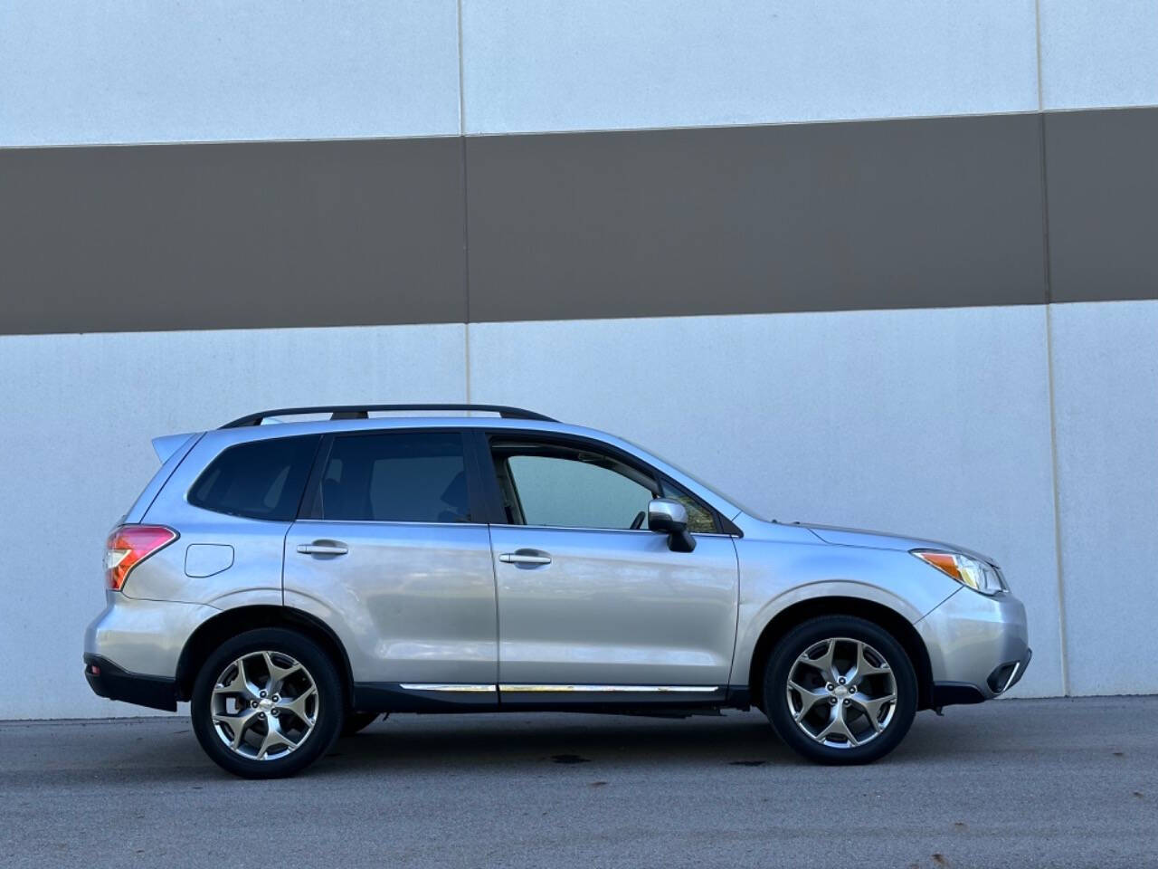 2016 Subaru Forester for sale at Phoenix Motor Co in Romulus, MI