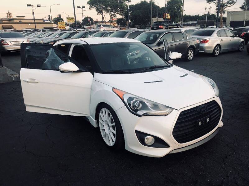 2013 Hyundai Veloster for sale at Crown Auto Inc in South Gate CA