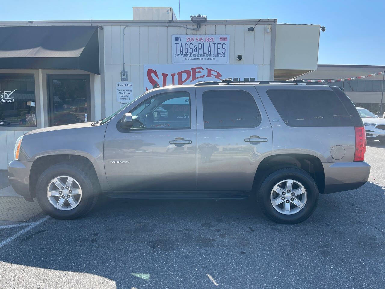 2014 GMC Yukon for sale at Super Auto Sales Modesto in Modesto, CA