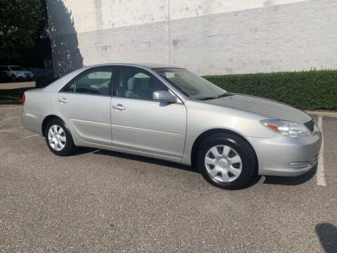 2003 Toyota Camry for sale at Select Auto in Smithtown NY