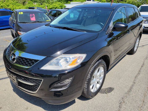 2011 Mazda CX-9 for sale at Howe's Auto Sales in Lowell MA