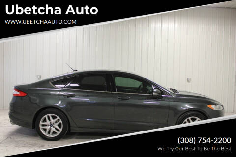 2015 Ford Fusion for sale at Ubetcha Auto in Saint Paul NE