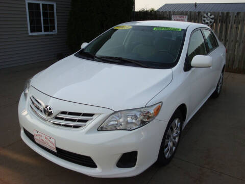2013 Toyota Corolla for sale at Cross-Roads Car Company in North Liberty IA