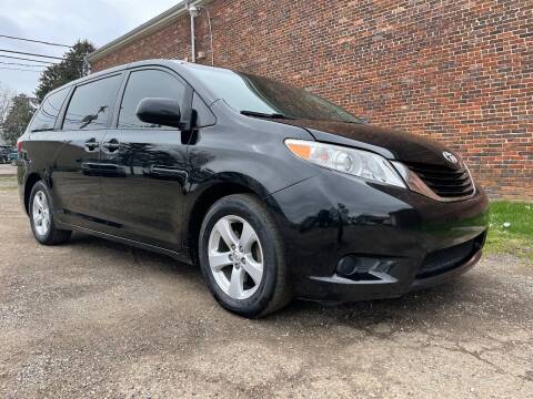2015 Toyota Sienna for sale at Jim's Hometown Auto Sales LLC in Byesville OH