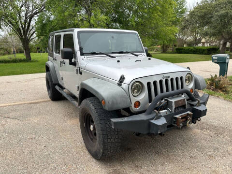 2010 Jeep Wrangler Unlimited for sale at CARWIN in Katy TX