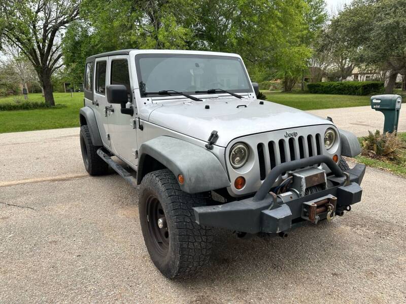 2010 Jeep Wrangler Unlimited for sale at Sertwin LLC in Katy TX