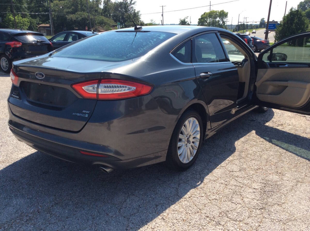 2016 Ford Fusion Hybrid for sale at SPRINGTIME MOTORS in Huntsville, TX