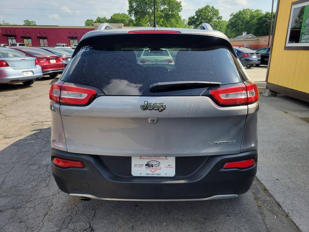 2014 Jeep Cherokee for sale at DAGO'S AUTO SALES LLC in Dalton, GA