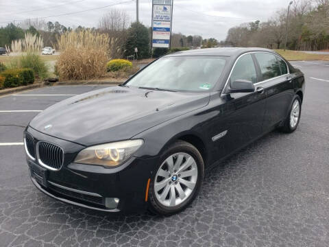 2010 BMW 7 Series for sale at GEORGIA AUTO DEALER LLC in Buford GA