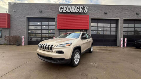 2014 Jeep Cherokee for sale at George's Used Cars in Brownstown MI