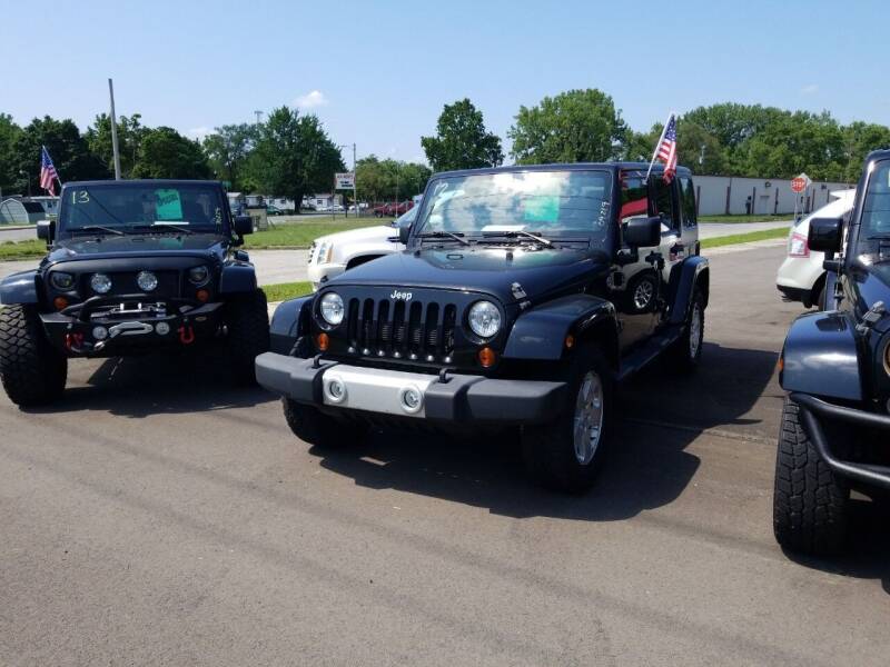 2012 Jeep Wrangler Unlimited for sale at M & H Auto & Truck Sales Inc. in Marion IN