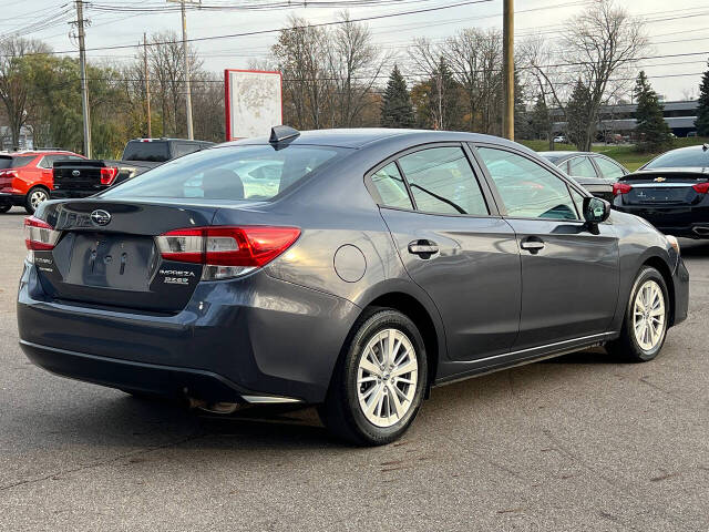 2017 Subaru Impreza for sale at Spartan Elite Auto Group LLC in Lansing, MI