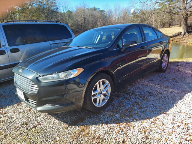 2014 Ford Fusion for sale at Victory Auto Sales LLC in Mooreville, MS