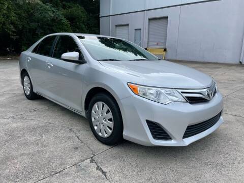 2012 Toyota Camry for sale at Legacy Motor Sales in Norcross GA