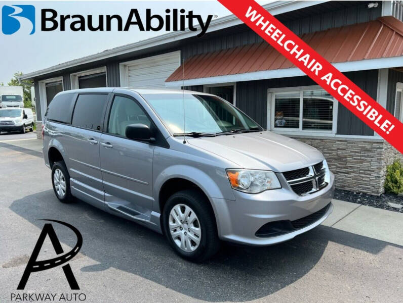 2014 Dodge Grand Caravan for sale at PARKWAY AUTO in Hudsonville MI
