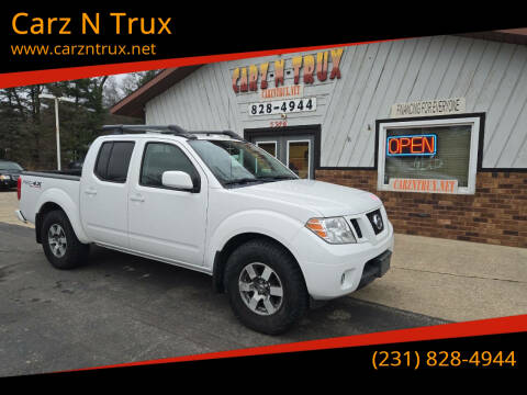 2011 Nissan Frontier for sale at Carz N Trux in Twin Lake MI