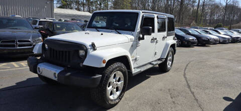 2014 Jeep Wrangler Unlimited for sale at GEORGIA AUTO DEALER LLC in Buford GA