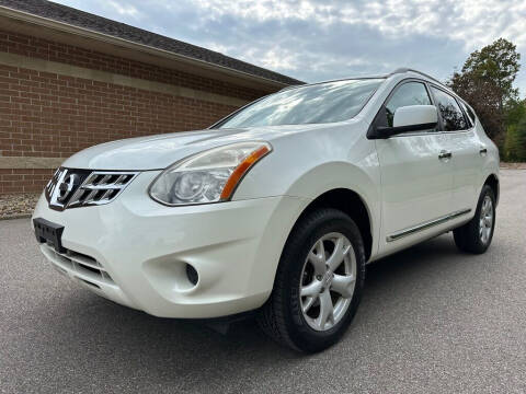 2011 Nissan Rogue for sale at Minnix Auto Sales LLC in Cuyahoga Falls OH
