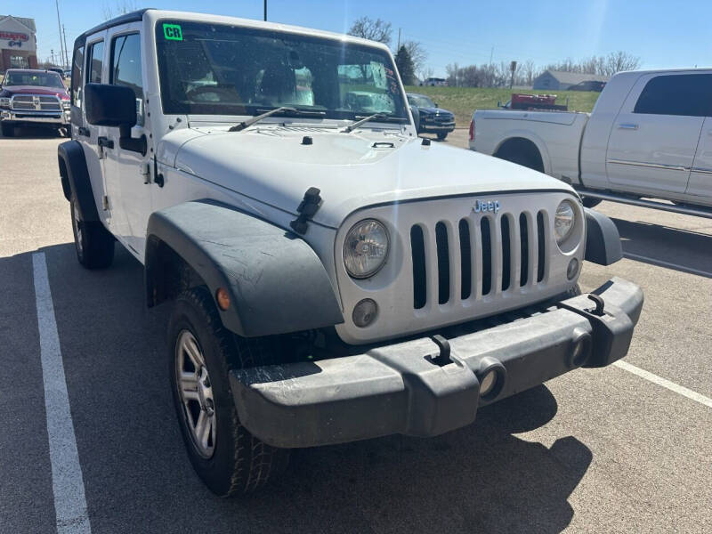 2017 Jeep Wrangler Unlimited for sale at Postal Pete in Galena IL