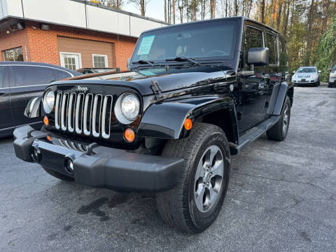 2017 Jeep Wrangler Unlimited for sale at Magic Motors Inc. in Snellville GA