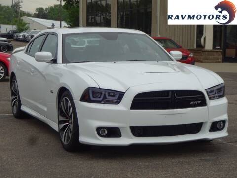 2014 Dodge Charger for sale at RAVMOTORS 2 in Crystal MN