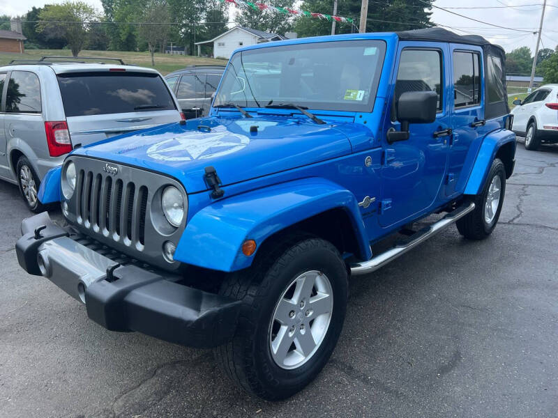 Used 2014 Jeep Wrangler Unlimited Sport with VIN 1C4BJWDG8EL214613 for sale in Dillonvale, OH