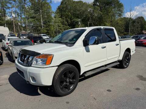 2012 Nissan Titan for sale at GEORGIA AUTO DEALER LLC in Buford GA