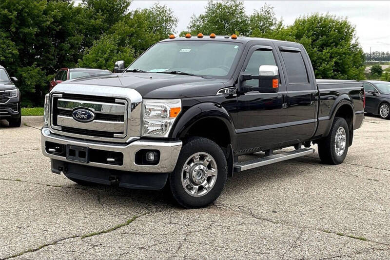 Used 2014 Ford F-250 Super Duty Lariat with VIN 1FT7W2B63EEA83007 for sale in Montevideo, Minnesota