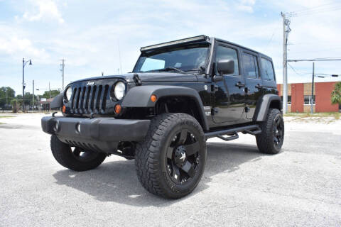2012 Jeep Wrangler Unlimited for sale at Advantage Auto Group Inc. in Daytona Beach FL