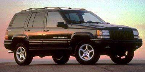 1998 Jeep Grand Cherokee for sale at New Wave Auto Brokers & Sales in Denver CO