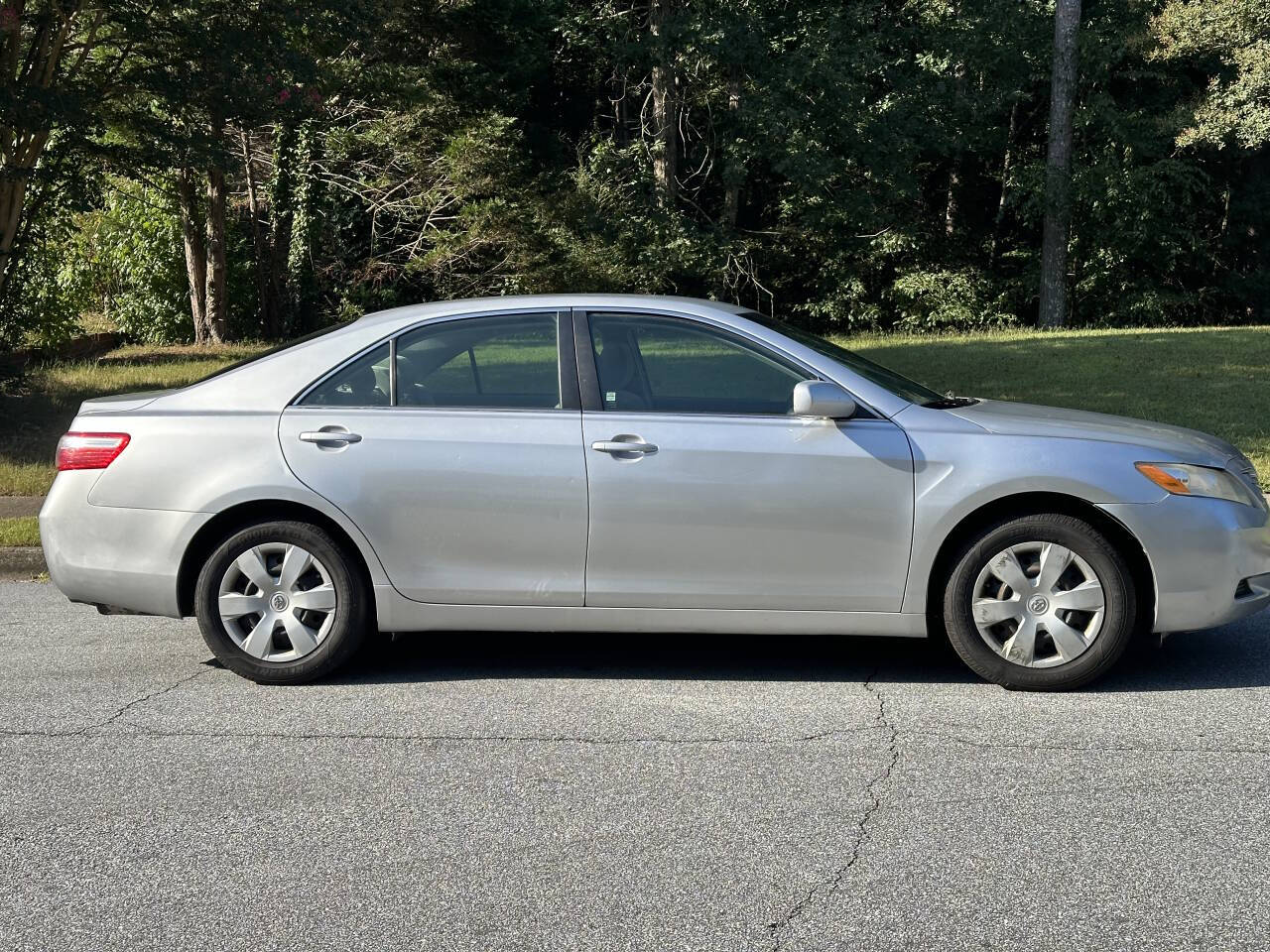 2009 Toyota Camry for sale at SHURE AUTO SALES in Snellville, GA