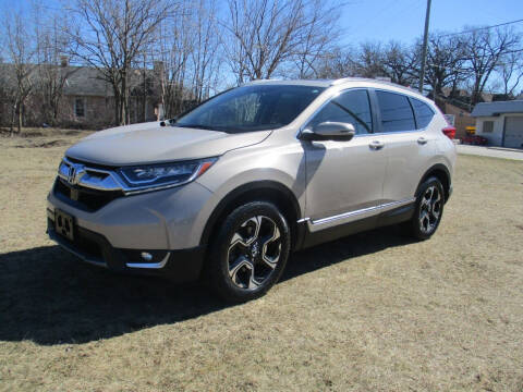 2017 Honda CR-V for sale at Triangle Auto Sales in Elgin IL