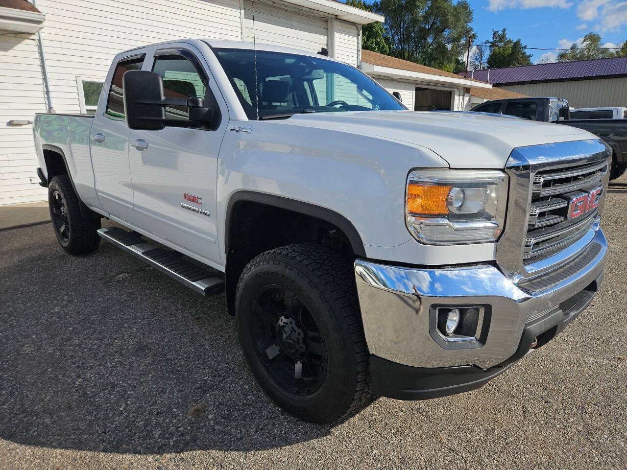 2015 GMC Sierra 2500HD for sale at DANGO AUTO SALES in HOWARD CITY, MI